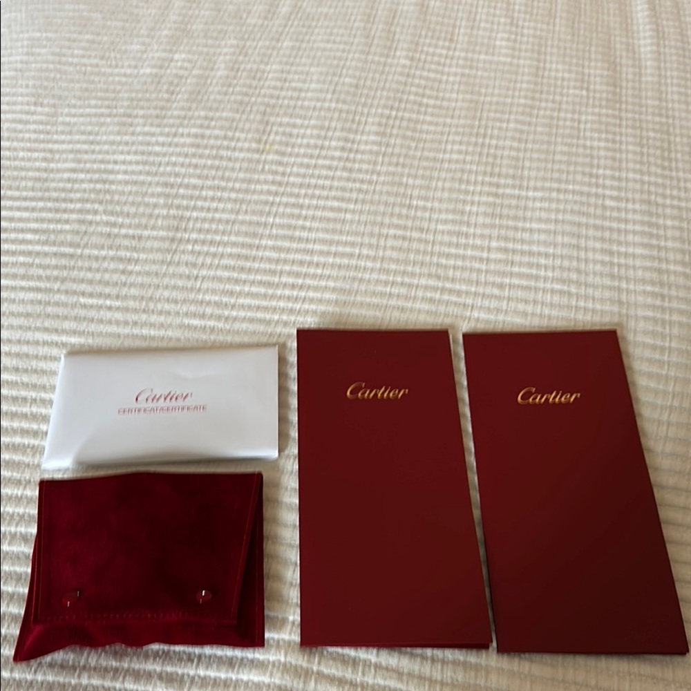 Cartier Red Pouch and Booklets Set.